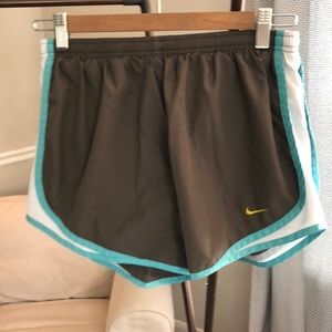 Gray and blue nike running shorts